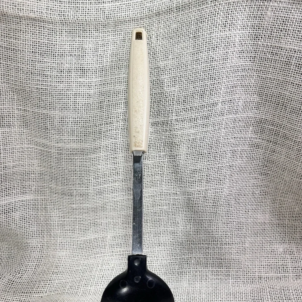 EKCO USA Slotted Spoon Floral Handle Multilingual 